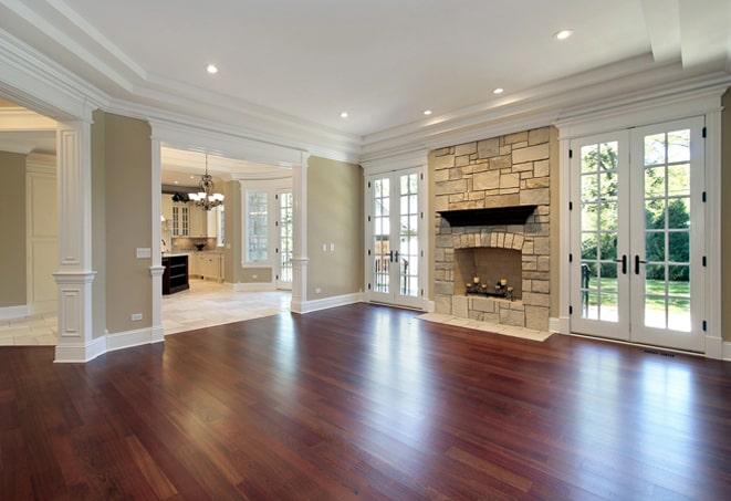 scuffed oak hardwood floors in a living room